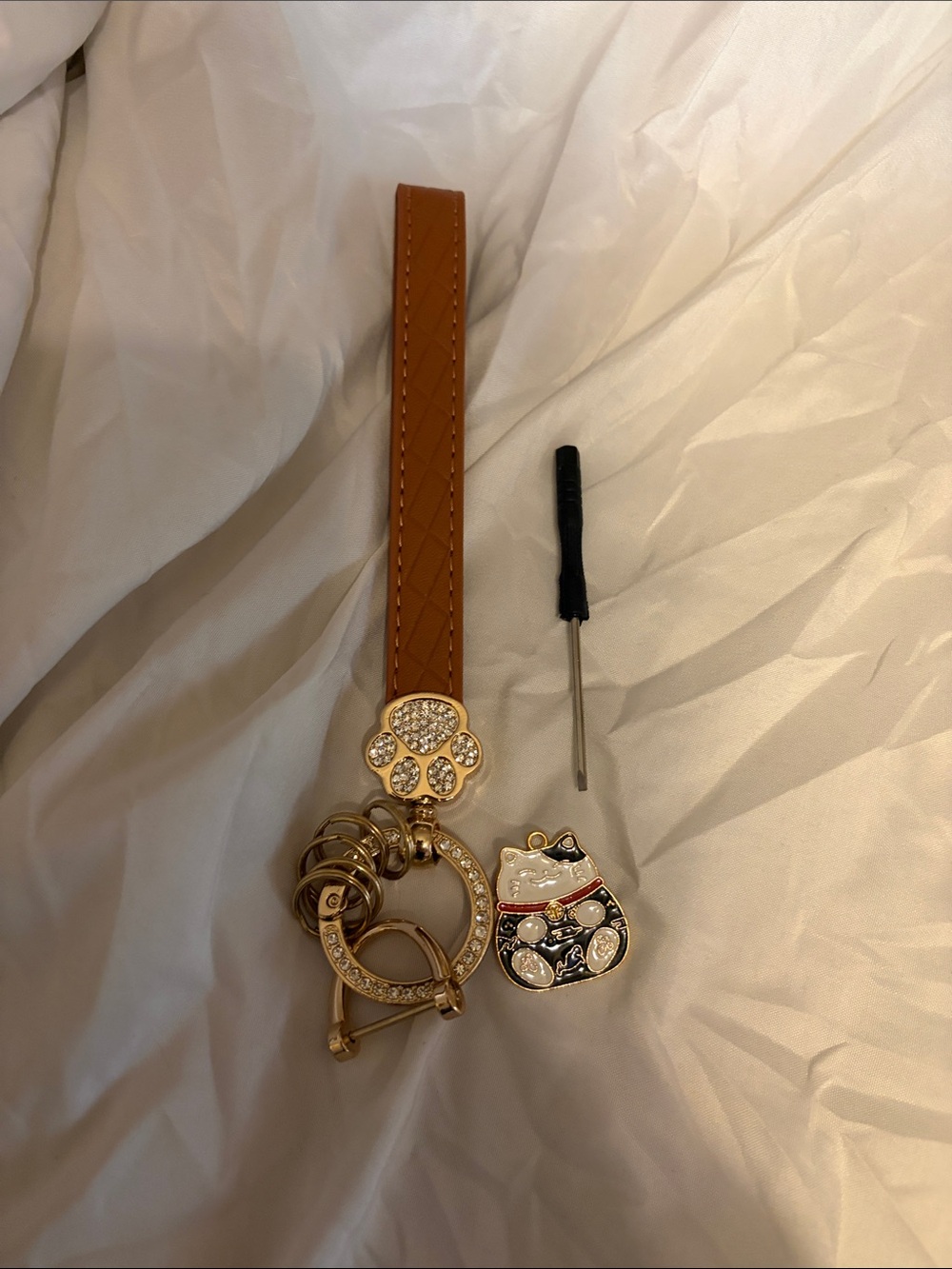 Tan Leather Wristlet Keychain with Gold Paw and Lucky Cat Charms
